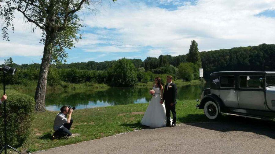 Hinter den Kulissenfoto vom Brautpaarfotoshooting mit Fotograf bei der Musikinsel Rheinau