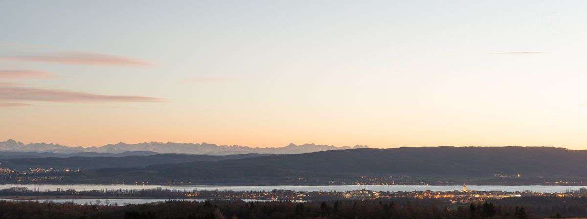 radolfzell-am-bodensee-winter-sonnenuntergang-lichter-alpen